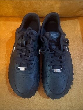 Nike JF1 Black Low-Top Sneakers with Textured Outsole